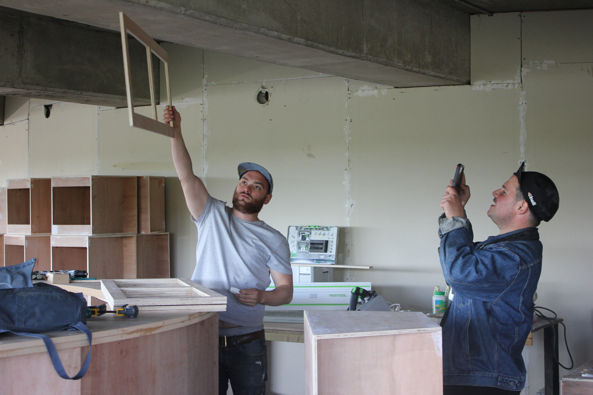 David fitting cabinetry on-site